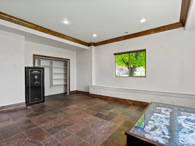 5577 E Elkhorn Dr, Eden, UT 84310 - empty room with crown molding, baseboards, stone tile floors, and recessed lighting