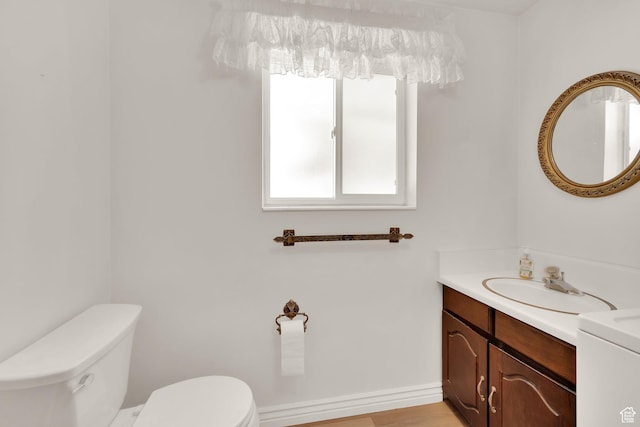 1607 Mountain Cir, Fruit Heights, UT 84037 - half bath featuring toilet, vanity, and baseboards