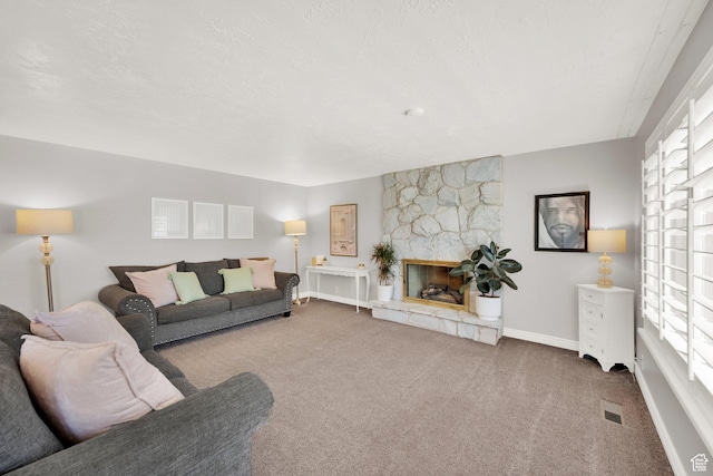 1607 Mountain Cir, Fruit Heights, UT 84037 - living room featuring carpet flooring, baseboards, and a stone fireplace