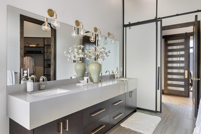 942 N Explorer Peak Dr Unit 420, Heber City, UT 84032 - full bathroom with double vanity and a walk in closet