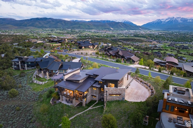 942 N Explorer Peak Dr Unit 420, Heber City, UT 84032 - aerial view at dusk of a mountain view and a residential view