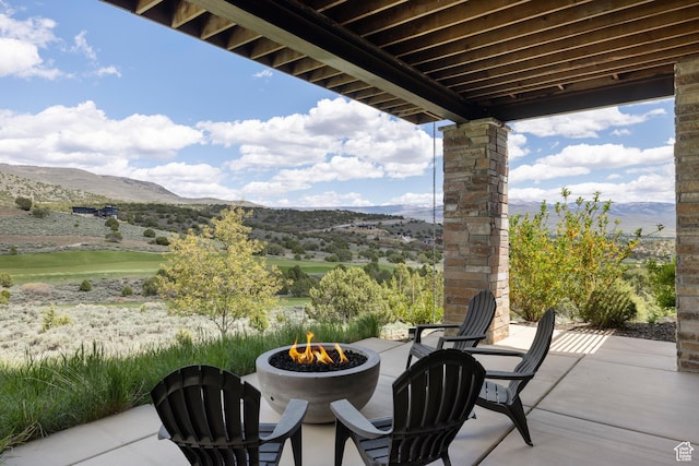 942 N Explorer Peak Dr Unit 420, Heber City, UT 84032 - view of patio with a fire pit and a mountain view