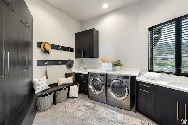 942 N Explorer Peak Dr Unit 420, Heber City, UT 84032 - laundry room featuring cabinet space, separate washer and dryer, and light tile patterned flooring
