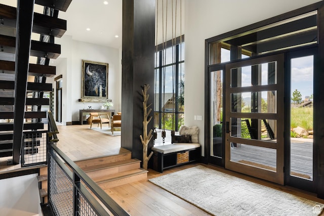942 N Explorer Peak Dr Unit 420, Heber City, UT 84032 - entryway featuring hardwood / wood-style flooring, a towering ceiling, and recessed lighting