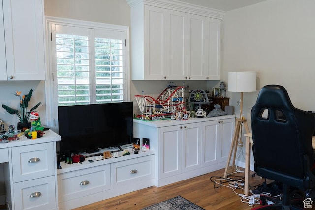 1444 S Beacon Dr E, Salt Lake City, UT 84108 - recreation room featuring plenty of natural light and wood finished floors