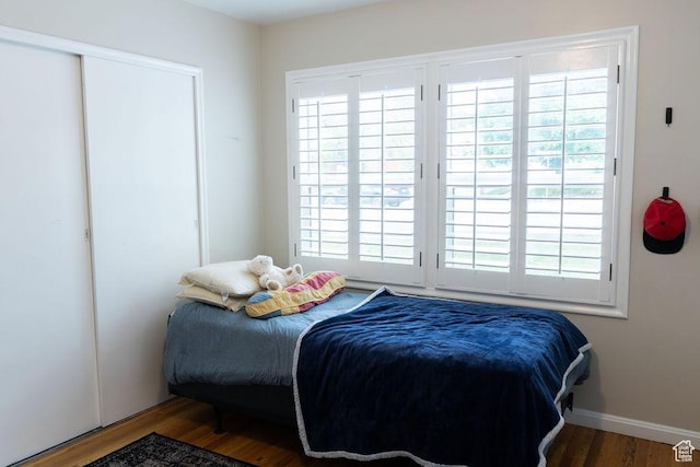 1444 S Beacon Dr E, Salt Lake City, UT 84108 - bedroom with wood finished floors and baseboards