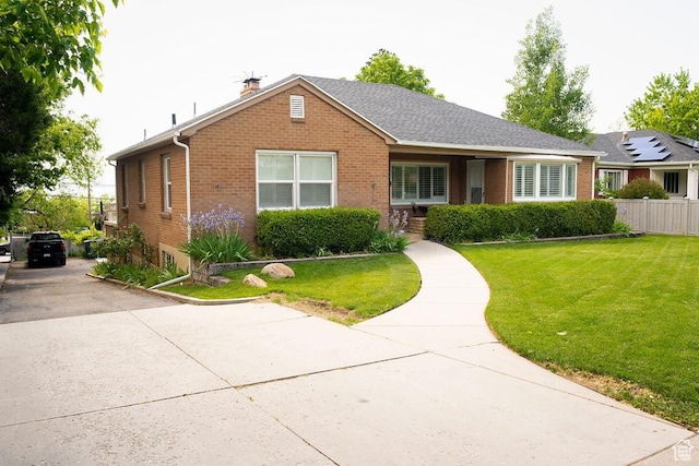 1444 S Beacon Dr E, Salt Lake City, UT 84108 - view of front facade with brick siding and a chimney