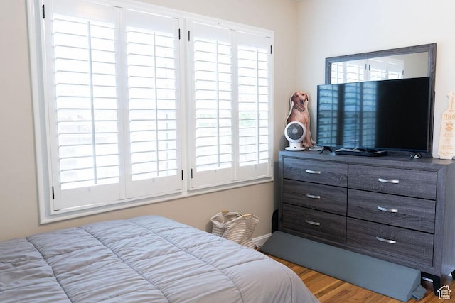1444 S Beacon Dr E, Salt Lake City, UT 84108 - bedroom featuring wood finished floors