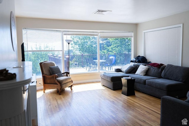 1444 S Beacon Dr E, Salt Lake City, UT 84108 - living area featuring wood finished floors