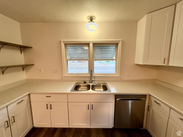 144 S 100 W, Tremonton, UT 84337 - kitchen featuring stainless steel dishwasher, a sink, open shelves, white cabinets, and a textured ceiling