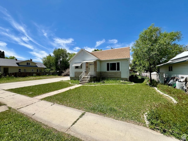 144 S 100 W, Tremonton, UT 84337 - view of front facade with concrete driveway and a shingled roof