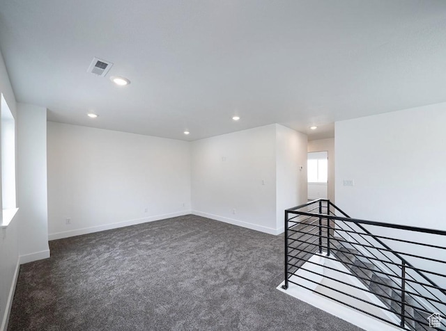 709 E 2450 N, North Logan, UT 84341 - unfurnished room featuring dark carpet, recessed lighting, and baseboards