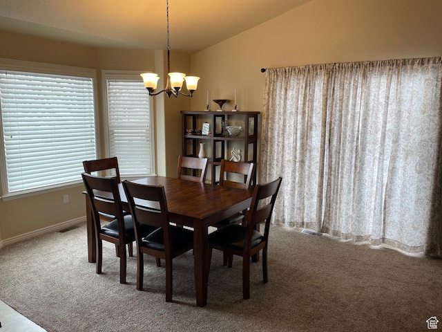 536 E 2200 N, North Ogden, UT 84414 - carpeted dining area with a chandelier, vaulted ceiling, and baseboards