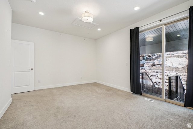 3041 Cedar Dr, Park City, UT 84098 - spare room featuring carpet floors, attic access, and recessed lighting