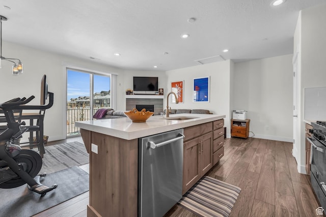 3041 Cedar Dr, Park City, UT 84098 - kitchen with a sink, stainless steel dishwasher, light countertops, wood finished floors, and baseboards
