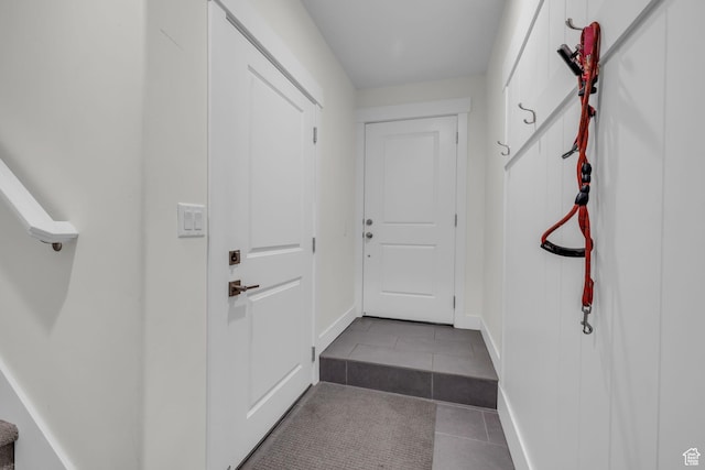 3041 Cedar Dr, Park City, UT 84098 - doorway to outside featuring tile patterned flooring and baseboards