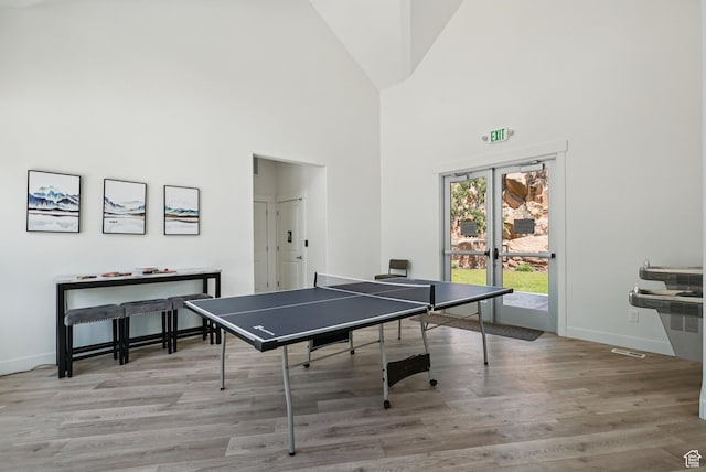 3041 Cedar Dr, Park City, UT 84098 - playroom featuring wood finished floors, french doors, and a high ceiling