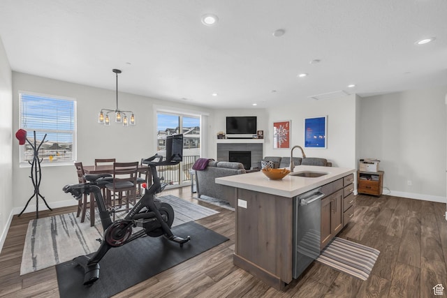 3041 Cedar Dr, Park City, UT 84098 - kitchen featuring a sink, light countertops, healthy amount of natural light, a chandelier, and recessed lighting