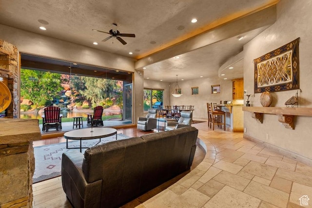 2405 W Entrada Trl Unit 76, St George, UT 84770 - living area with recessed lighting, ceiling fan, plenty of natural light, and stone tile flooring