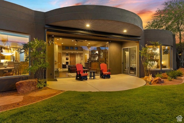 2405 W Entrada Trl Unit 76, St George, UT 84770 - rear view of house featuring a patio area and a yard