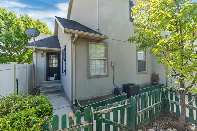 1770 W 950 S, Springville, UT 84663 - view of home's exterior featuring stucco siding, roof with shingles, and entry steps