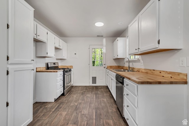 1770 W 950 S, Springville, UT 84663 - kitchen with a sink, stainless steel appliances, dark wood-type flooring, butcher block counters, and baseboards