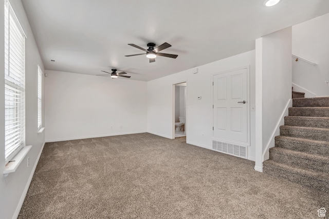 1770 W 950 S, Springville, UT 84663 - carpeted empty room with a ceiling fan, stairway, plenty of natural light, and baseboards