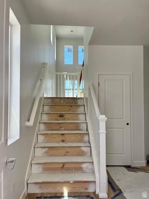6858 S Mt Meek Dr Unit 211, West Jordan, UT 84081 - stairway featuring baseboards