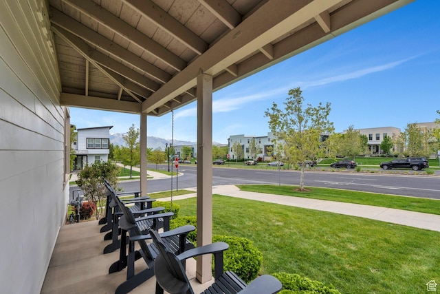 10394 S Crow Wing Dr, South Jordan, UT 84009 - porch with a mountain view and a yard