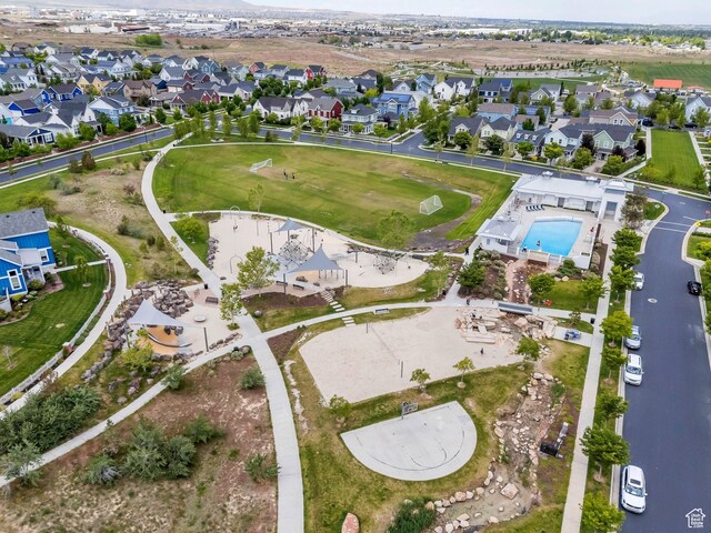 10394 S Crow Wing Dr, South Jordan, UT 84009 - aerial overview of property's location with nearby suburban area and a pool area