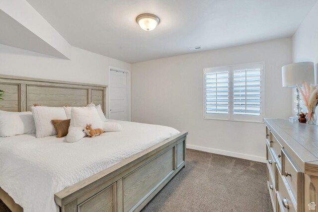 10394 S Crow Wing Dr, South Jordan, UT 84009 - bedroom with baseboards and dark carpet