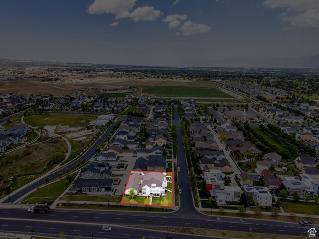 10394 S Crow Wing Dr, South Jordan, UT 84009 - aerial perspective of suburban area with property parcel outlined