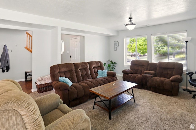 679 S Trail Cir W, Logan, UT 84341 - carpeted living room featuring baseboards