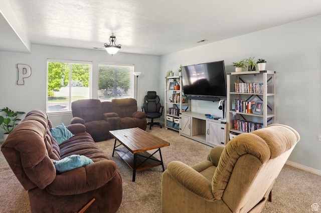 679 S Trail Cir W, Logan, UT 84341 - living area with light colored carpet and baseboards