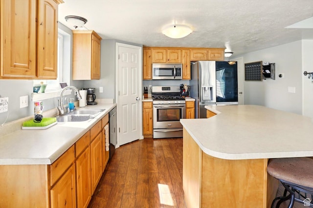 679 S Trail Cir W, Logan, UT 84341 - kitchen featuring stainless steel appliances, a sink, and light countertops