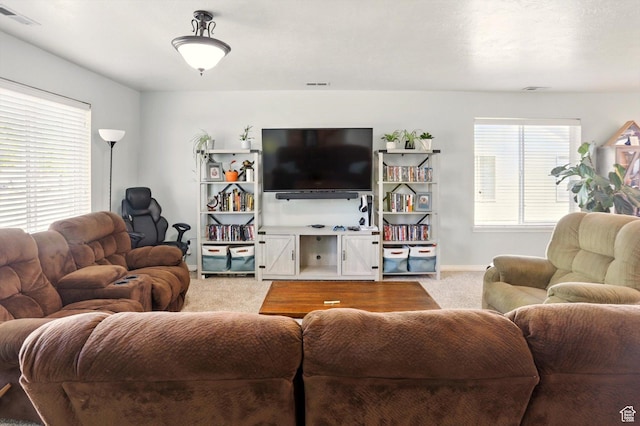 679 S Trail Cir W, Logan, UT 84341 - living room with light carpet and baseboards