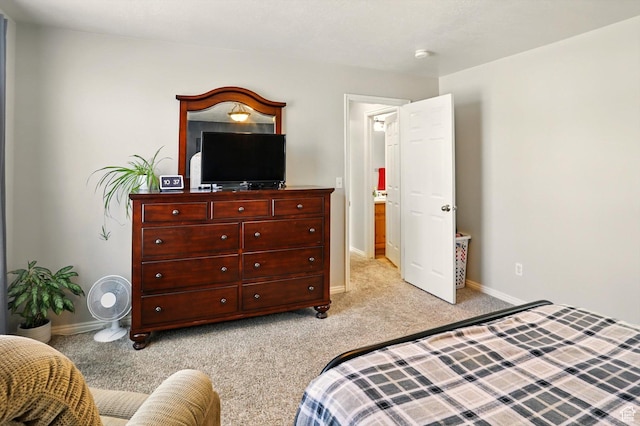 679 S Trail Cir W, Logan, UT 84341 - bedroom featuring light carpet and baseboards