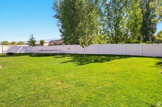 679 S Trail Cir W, Logan, UT 84341 - view of yard with a trampoline