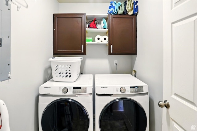 679 S Trail Cir W, Logan, UT 84341 - washroom featuring cabinet space and washer and clothes dryer
