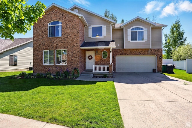 679 S Trail Cir W, Logan, UT 84341 - traditional home with concrete driveway, a garage, and brick siding