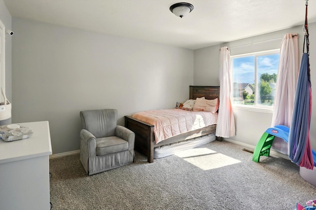 679 S Trail Cir W, Logan, UT 84341 - bedroom featuring carpet and baseboards