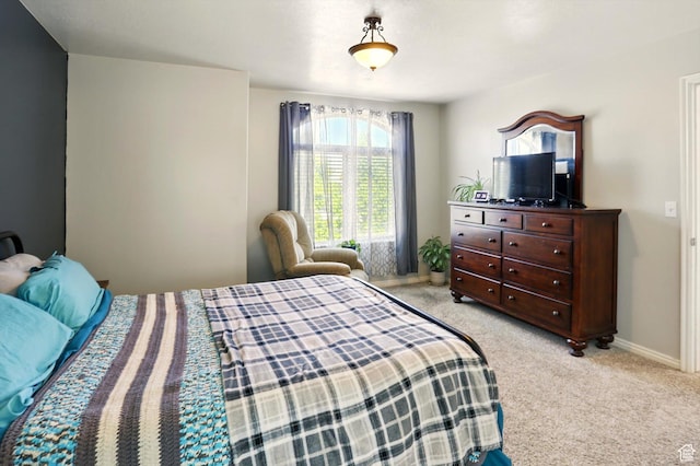 679 S Trail Cir W, Logan, UT 84341 - bedroom with light colored carpet and baseboards