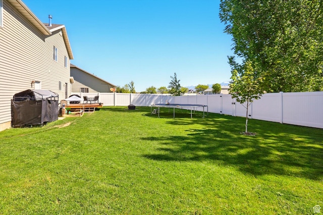 679 S Trail Cir W, Logan, UT 84341 - view of yard with a trampoline