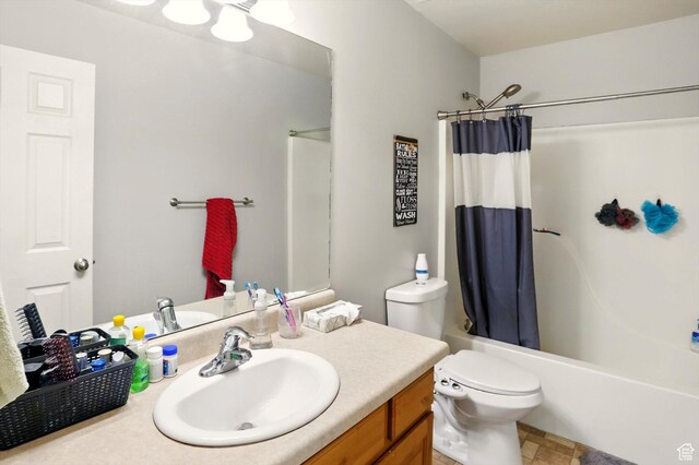 679 S Trail Cir W, Logan, UT 84341 - full bath featuring vanity, shower / tub combo with curtain, and toilet