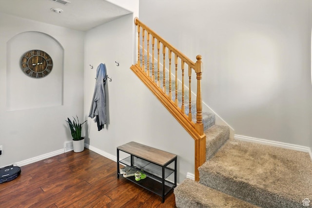679 S Trail Cir W, Logan, UT 84341 - stairway featuring baseboards and wood finished floors