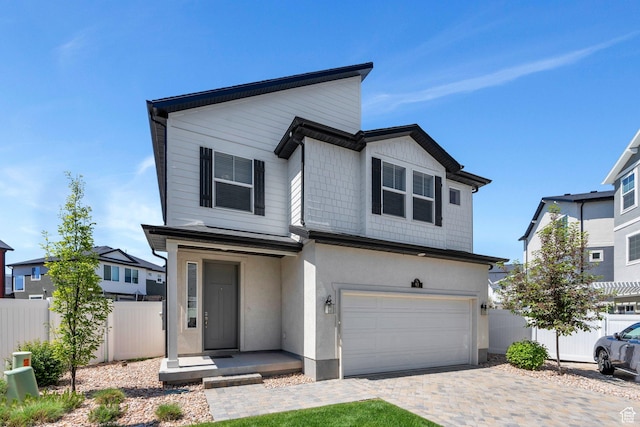 97 E Polaris Dr S Unit 394, Saratoga Springs, UT 84045 - view of front of house with an attached garage and driveway