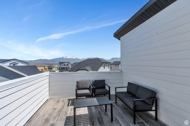 97 E Polaris Dr S Unit 394, Saratoga Springs, UT 84045 - wooden terrace featuring a mountain view, an outdoor living space, and a residential view
