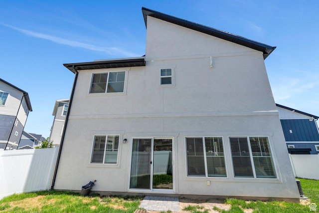 97 E Polaris Dr S Unit 394, Saratoga Springs, UT 84045 - back of property featuring stucco siding