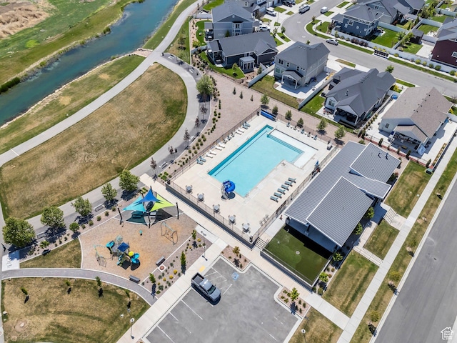 97 E Polaris Dr S Unit 394, Saratoga Springs, UT 84045 - aerial view of residential area with a nearby body of water and a pool