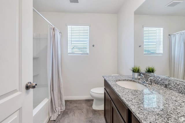 97 E Polaris Dr S Unit 394, Saratoga Springs, UT 84045 - full bathroom featuring vanity, healthy amount of natural light, toilet, and shower / tub combo with curtain